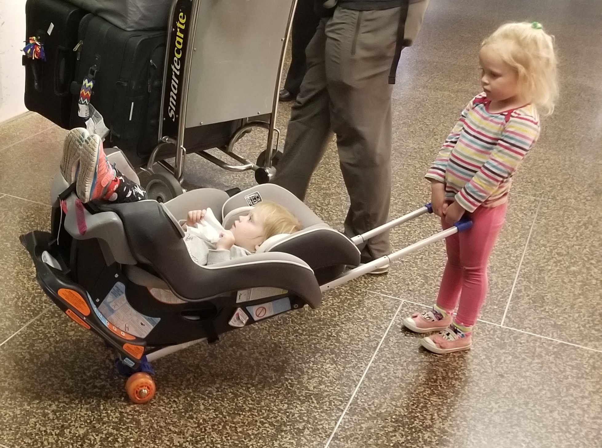 get-car-seats-through-an-airport-more-easily-kid-travel-coach